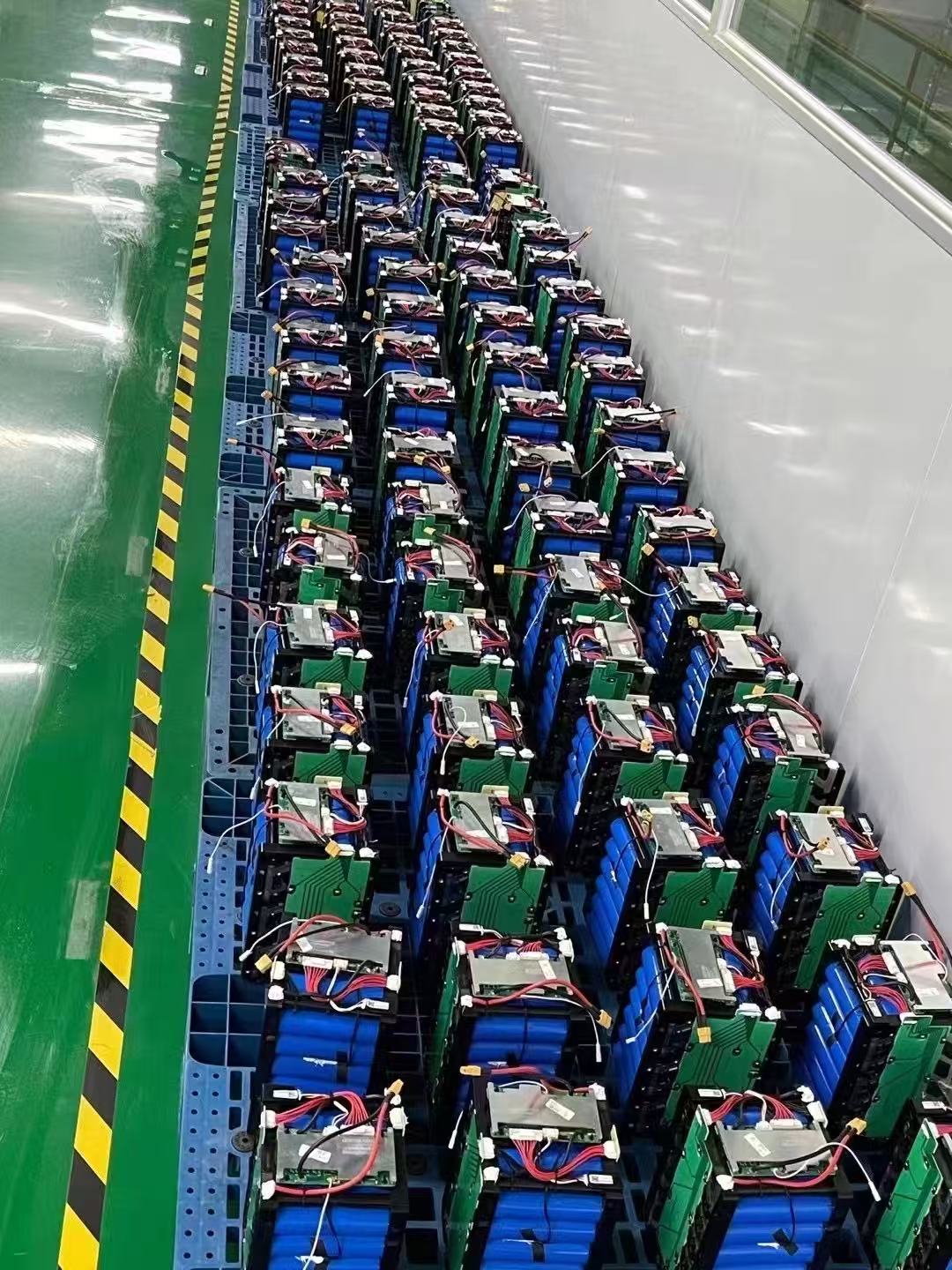 Rows of assembled lithium battery packs for solar street lights in WILSOLAR's Zhongshan factory